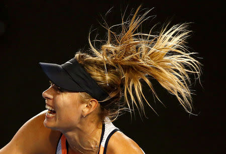 FILE PHOTO - Russia's Maria Sharapova serves during her third round match against Lauren Davis of the U.S. at the Australian Open tennis tournament at Melbourne Park, Australia, January 22, 2016. REUTERS/Thomas Peter/File Photo