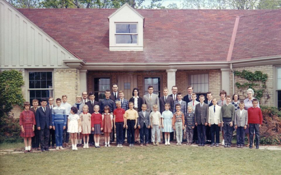 Students and teachers of the newly formed Academy for Basic Education, which would later become Brookfield Academy, pose for a picture on the first day of classes in 1962.