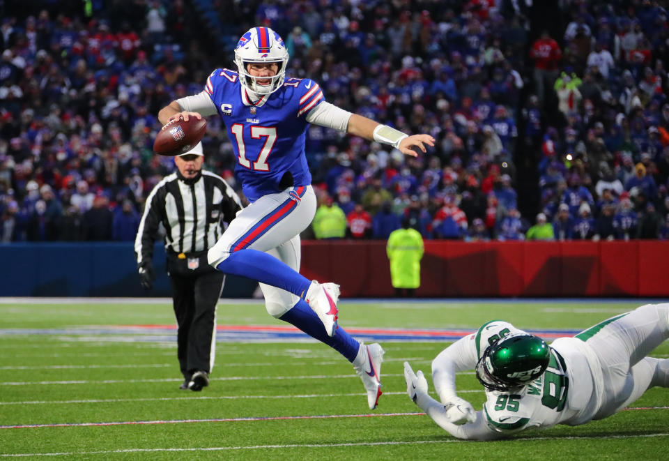 ORCHARD PARK, NEW YORK - JANUARY 09: Josh Allen #17 of the Buffalo Bills scrambles against the New York Jets during the first quarter at Highmark Stadium on January 09, 2022 in Orchard Park, New York. (Photo by Timothy T Ludwig/Getty Images)