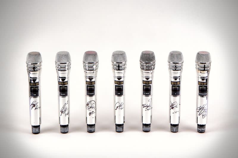 Seven signed microphones used by K-Pop boy band BTS, described as the first ever items to come to auction from the band, are seen in an undated photo before an auction online in Los Angeles