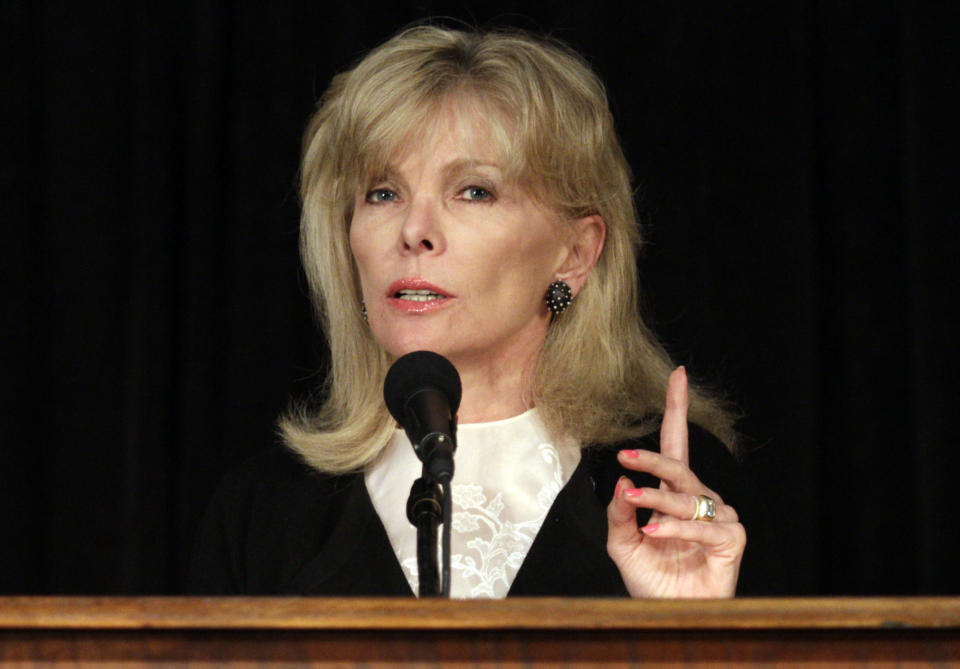 FILE - This March 24, 2011 file photo shows Darla Moore speaking to students at the University of South Carolina, in Columbia, S.C. For the first time in it's 80-year history, Augusta National Golf Club has female members. The home of the Masters, under increasing criticism the last decade because of its all-male membership, invited former Secretary of State Condoleeza Rice and South Carolina financier Moore to become the first women in green jackets when the club opens for a new season in October. (AP Photo/Brett Flashnick)