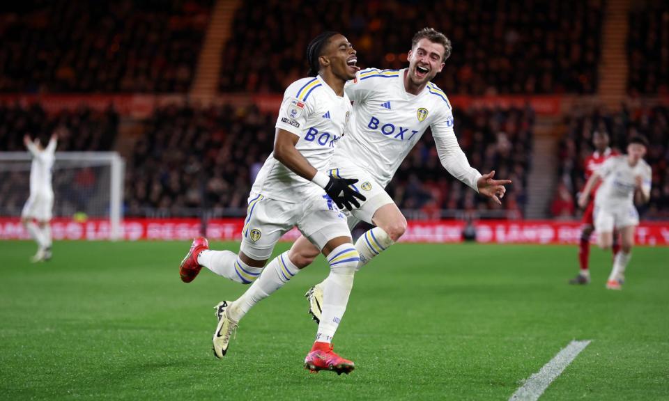 <span>Crysencio Summerville wheels away, pursued by Patrick Bamford, after scoring Leeds’ fourth goal.</span><span>Photograph: Ed Sykes/Getty Images</span>