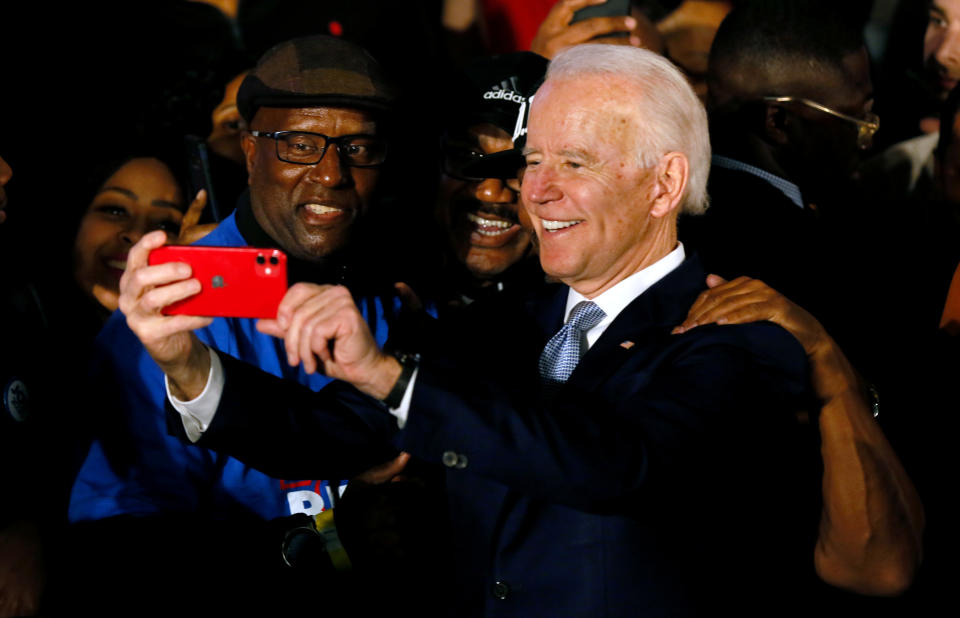 Former Vice President Joe Biden takes photos with supporters at his South Carolina primary night rally in Columbia, S.C. (Reuters/Elizabeth Frantz)