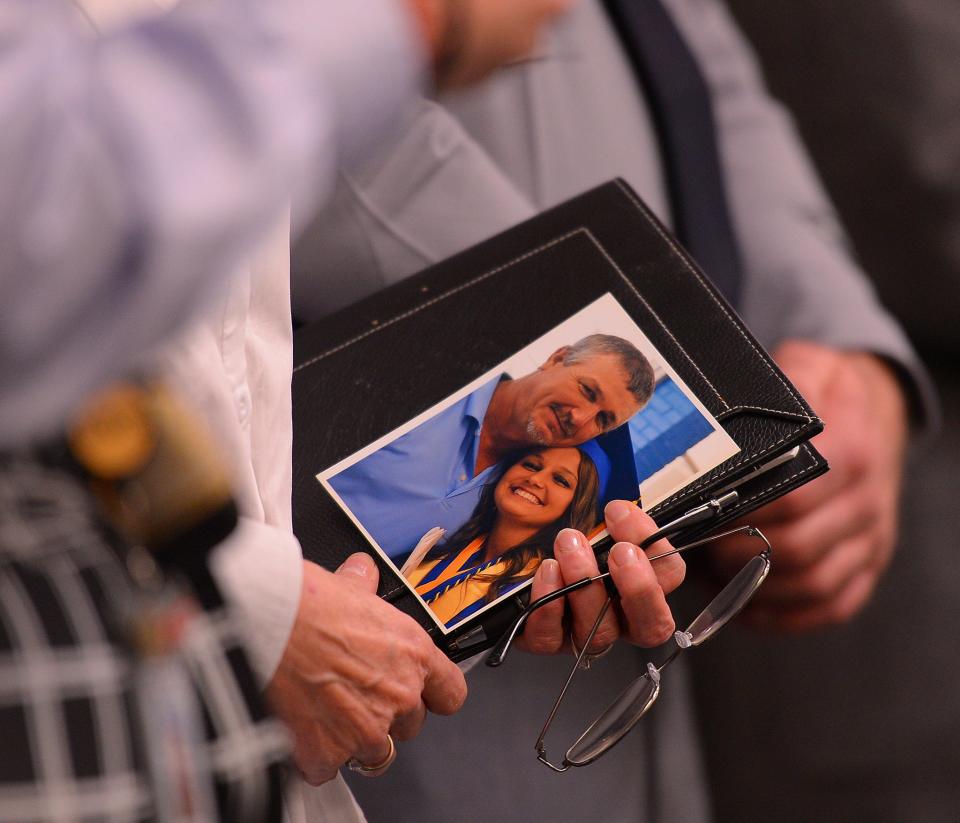 A bond hearing was held for Caleb Kennedy during a magistrate court session in Spartanburg, Wednesday morning, February 9, 2022. Kennedy, 17, is charged with felony DUI resulting in the death of Larry Parris, 54, at his home near Pacolet Feb. 8. MADD Victim Services Manager Kimberly Cockrell holds a photo of victim Larry Parris with his daughter Kelsey during the hearing.