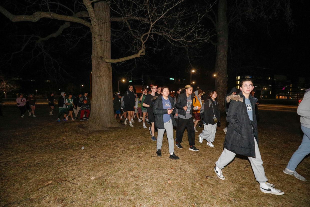 Michigan State University students evacuate to a safe area during an active shooter situation on campus on 13 February 2023 in Lansing, Michigan (Getty Images)