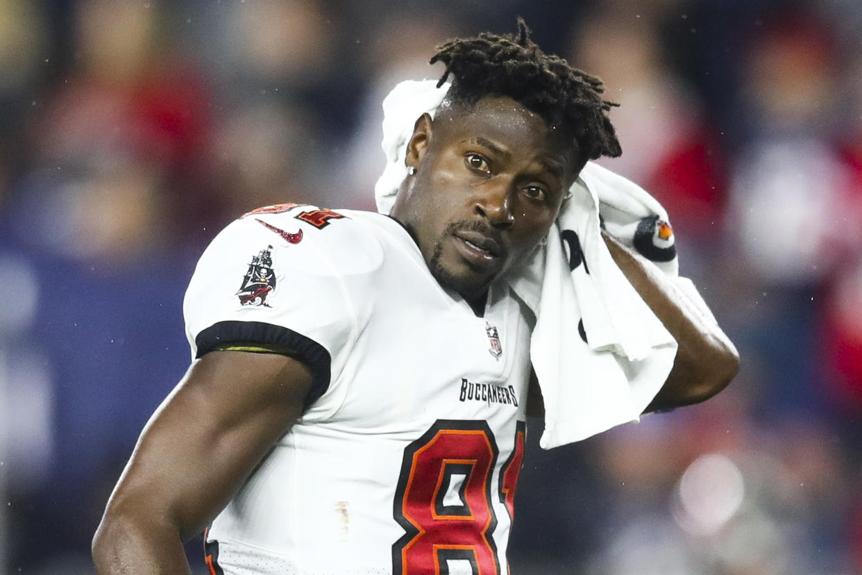 The NFL said it's reviewing a report that Bucs wide receiver Antonio Brown allegedly sought a face COVID vaccination card. (Photo by Adam Glanzman/Getty Images)