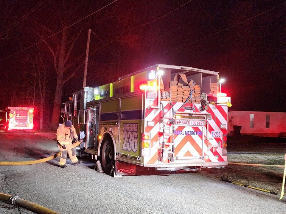 From his Facebook Timeline, New Town of Farragut Fire Inspector Charles Wilson connects the hose at a housefire for Rural Metro Fire in Powell. Dec 2022.