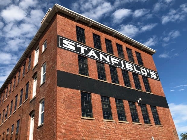 Stanfield's, in business since 1856 and in Truro since 1870,  had pivoted from underwear to manufacturing hospital gowns under government contract in 2020. (Vernon Ramesar/CBC - image credit)