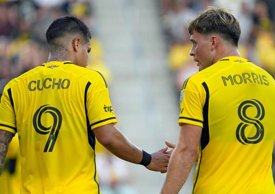 Jun 22, 2024; Columbus, OH, USA; Columbus Crew midfielder Aidan Morris (8) high-fives teammate Cucho Hernandez (9) after a corner kick against Sporting KC during the first half of their MLS game at Lower.com Field.