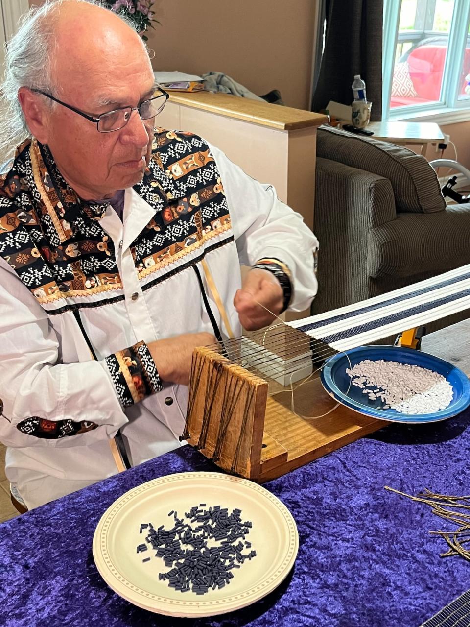 Ken Maracle is from Six Nations of the Grand River Territory and has been weaving wampum belts for 43 years and said he feels the presence of his ancestors as he’s making them.  