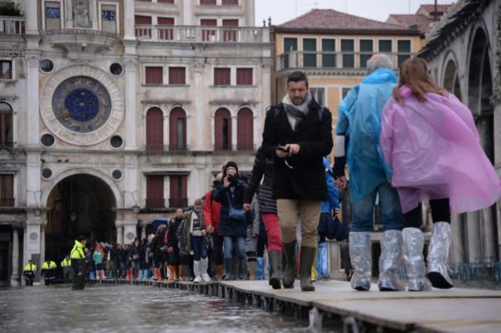 Hotels reported cancelled reservations, some as far ahead as December, following the widespread diffusion of images of Venice underwater (AFP Photo/Filippo MONTEFORTE )