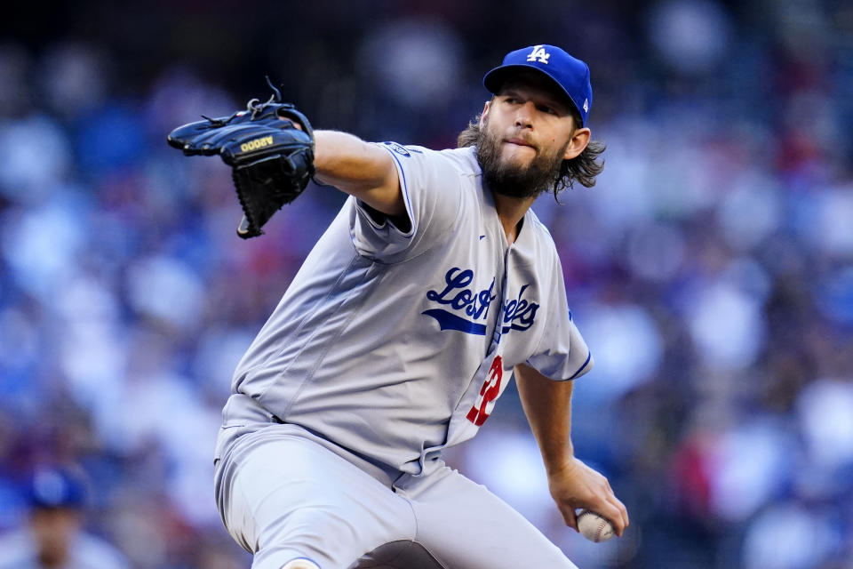 Los Angeles Dodgers starting pitcher Clayton Kershaw throws a pitch against the Arizona Diamondbacks during the first inning of a baseball game Saturday, Sept. 25, 2021, in Phoenix. (AP Photo/Ross D. Franklin)
