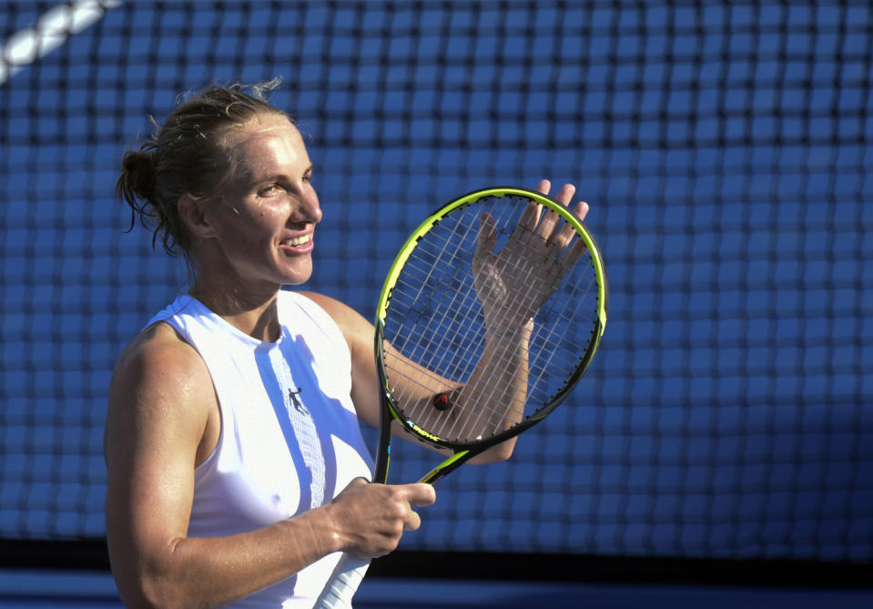 Svetlana Kuznetsova, of Russia, responds to the crowd after defeating Andrea Petkovic, of Germany, during the semifinals of the Citi Open tennis tournament in Washington, Saturday, Aug. 4, 2018. Because of rain delays, Kuznetsova had to play two matches on Saturday. She won both and advanced to the finals. (AP Photo/Susan Walsh)