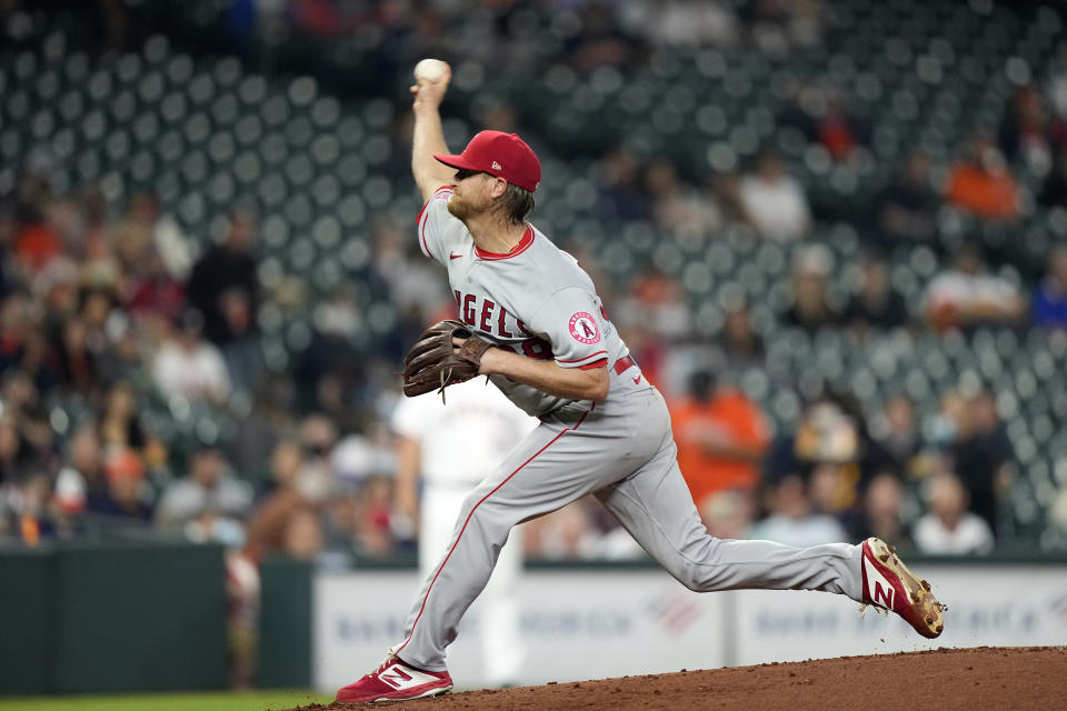 Los Angeles Angels starting pitcher Alex Cobb throws against the Houston Astros during the first inning of a baseball game Thursday, April 22, 2021, in Houston. (AP Photo/David J. Phillip)