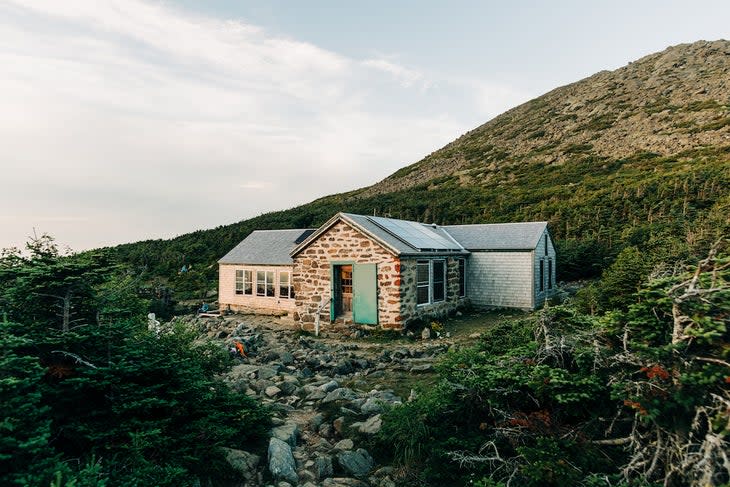 <span class="article__caption">You have eight huts to choose from here. This is the Madison Spring Hut, an above-the-treeline hut between Mt. Adams and Mt. Madison in the Presidential Range.</span> (Photo: Courtesy of AMC, Photo by Corey David Photography)