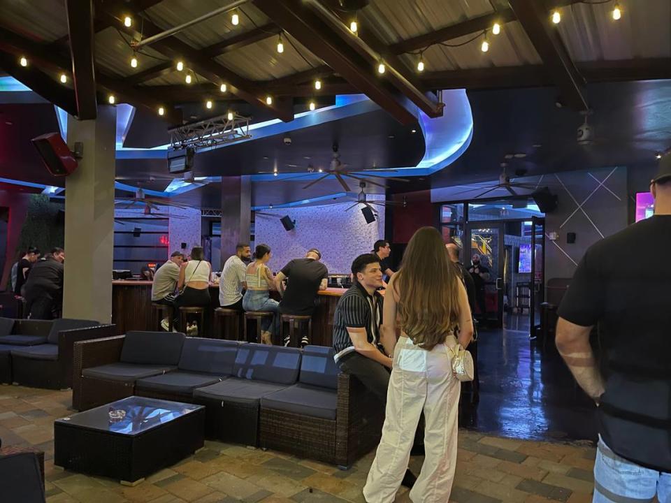 Martini Bar Doral reopens more than a week after a mass shooting that left two dead. Patrons return to have fun and honor slain security guard.