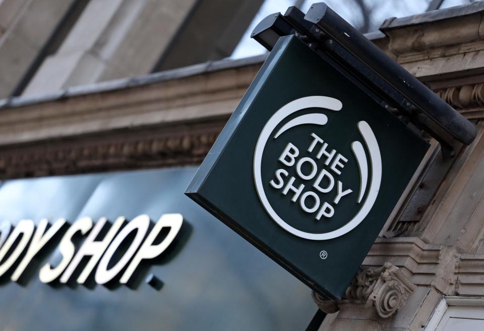 A sign is pictured above the entrance to a branch of The Body Shop in central London on February 12, 2024. The Body Shop, the near 50-year-old cosmetics company renowned for its ethical hair and skin products, is near bankrupt in the UK after poor Christmas trade, according to reports in British media.