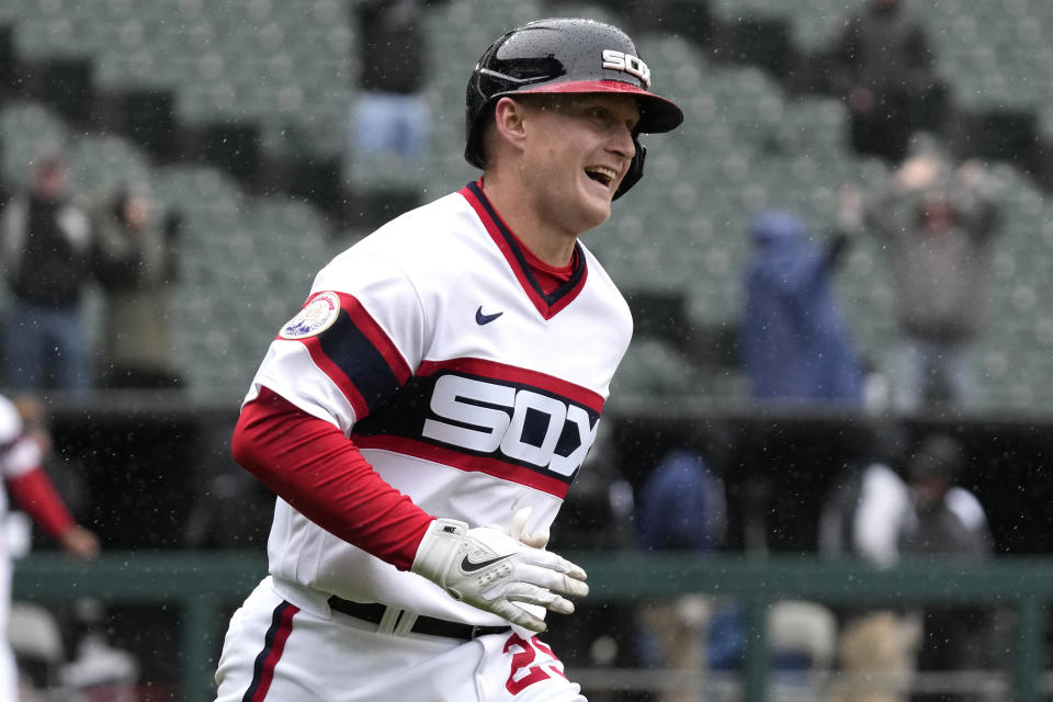 Chicago White Sox's Andrew Vaughn smiles as he rounds the bases after hitting the winning three-run home run during the ninth inning of a baseball game against the Tampa Bay Rays in Chicago, Sunday, April 30, 2023. (AP Photo/Nam Y. Huh)