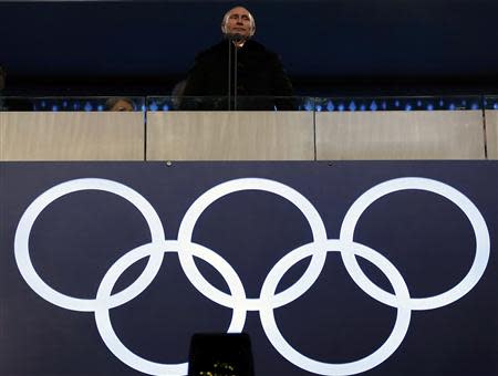 Russian President Vladimir Putin stands during the opening ceremony of the 2014 Sochi Winter Olympics, February 7, 2014. REUTERS/Phil Noble