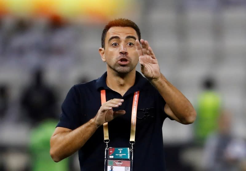 FOTO DE ARCHIVO: Reacción del entrenador de Al-Sadd Xavi en la Copa Mundial de Clubes - Fútbol - Cuartos de Final