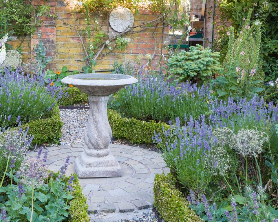 5. Embrace a whimsical style with a bird bath