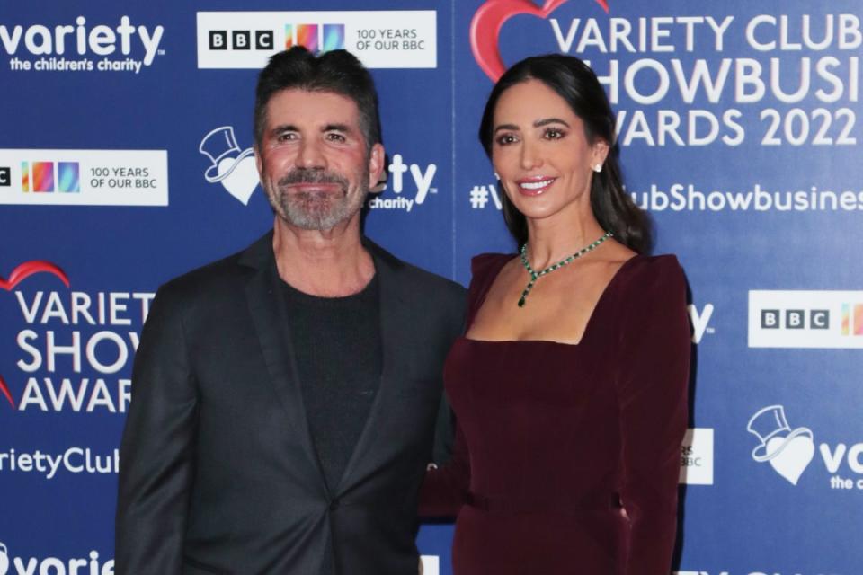 Simon Cowell pictured with partner Lauren Silverman (Dave Benett/Getty Images)