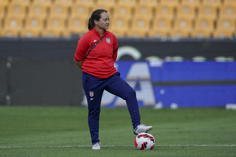 FILE - Twila Kilgore, assistant coach on the U.S. team watches players warm up prior to a CONCACAF women's championship soccer semifinal match against Costa Rica in Monterrey, Mexico, Thursday, July 14, 2022. Kilgore will serve as interim coach of the U.S women’s national team following the resignation of coach Vlatko Andonovski. U.S. Soccer formally announced Andonovski’s resignation on Thursday, Aug. 17. (AP Photo/Fernando Llano, File)