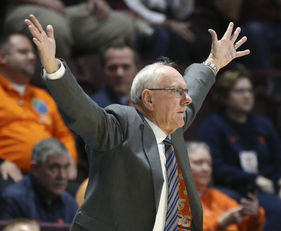 Syracuse coach Jim Boeheim signals for his team to play defense during the first half of an NCAA college basketball game against Virginia Tech in Blacksburg Va., Saturday, Jan. 18 2020. (Matt Gentry/The Roanoke Times via AP)