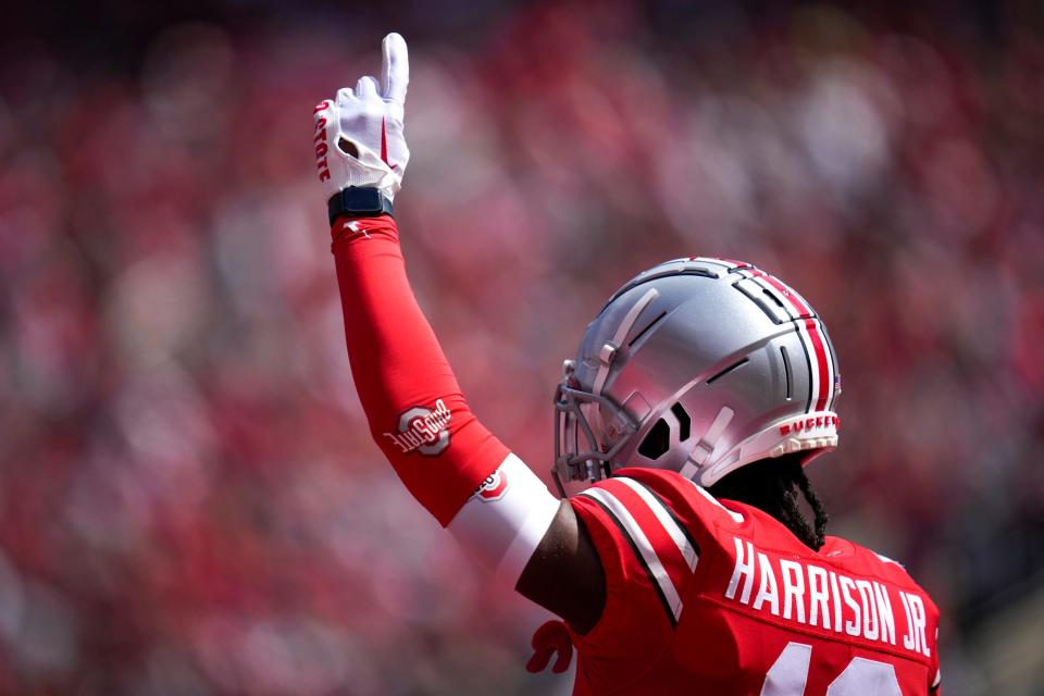 Apr 15, 2023; Columbus, Ohio, United States; Ohio State Buckeyes wide receiver Marvin Harrison Jr. (18) points a finger to the sky after a successful catch during the first quarter of the Ohio State Buckeyes spring game at Ohio Stadium on Saturday morning. Mandatory Credit: Joseph Scheller-The Columbus Dispatch<br>Joseph Scheller/Columbus Dispatch / USA TODAY NETWORK