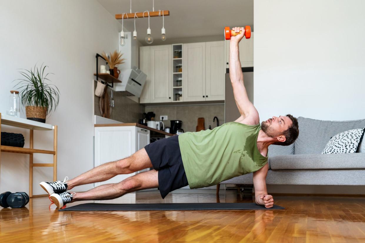 Man does anaerobic workout at home