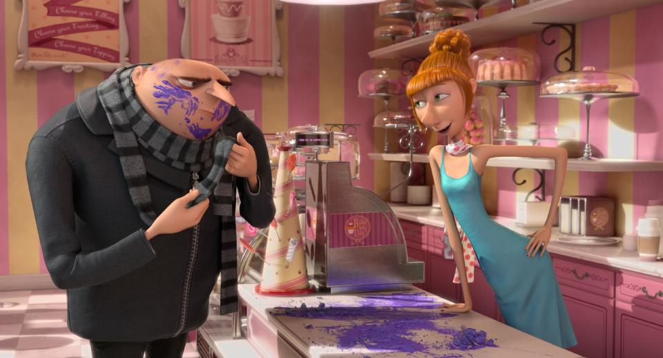 This film publicity image released by Universal Pictures shows characters Lucy, voiced by Kristen Wiig, right, and Gru, voiced by Steve Carell in "Despicable Me 2." (AP Photo/Universal Pictures)