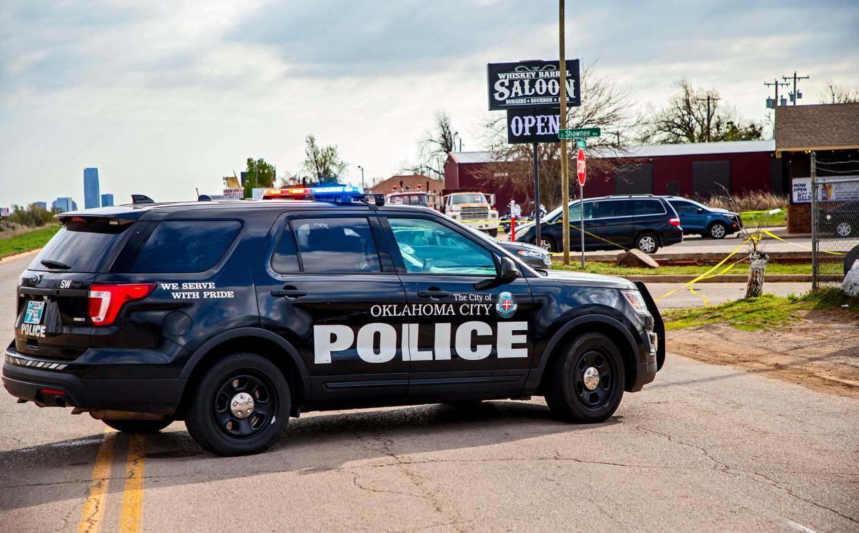 Oklahoma City Police investigate the scene at Whiskey Barrel Saloon in Oklahoma City, Okla. on Sunday, April 2, 2023, after a shooting Saturday evening  killed at least three  people.