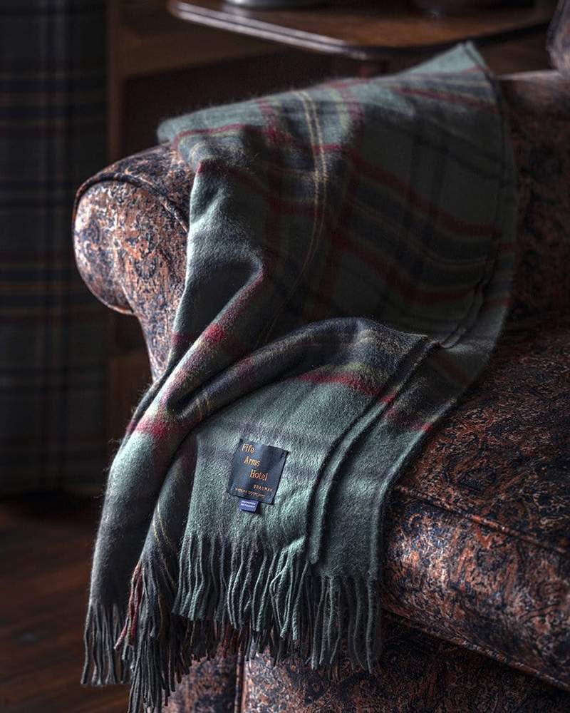 <p><a href="https://shop.thefifearms.com/collections/the-fife-arms-signature/products/the-fife-arms-tartan-blanket" rel="nofollow noopener" target="_blank" data-ylk="slk:Shop Now;elm:context_link;itc:0;sec:content-canvas" class="link ">Shop Now</a></p><p>The Fife Arms Tartan Blanket, Lambswool</p><p>thefifearms.com</p><p>£273.00</p><span class="copyright">The Fife Arms</span>