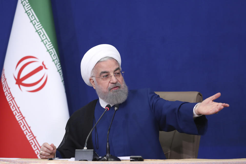 In this photo released by the official website of the office of the Iranian Presidency, outgoing President Hassan Rouhani speaks in the last meeting of his cabinet in Tehran, Iran, Sunday, Aug. 1, 2021. Rouhani on Sunday acknowledged his nation at times "did not tell part of the truth" to its people during his eight-year tenure, as he prepares to leave office with his signature nuclear deal with world powers in tatters and tensions high with the West. (Iranian Presidency Office via AP)