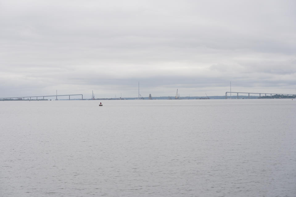 Work continues to remove the wreckage of the collapsed Francis Scott Key Bridge, in Baltimore, Monday, May 20, 2024. (AP Photo/Matt Rourke)