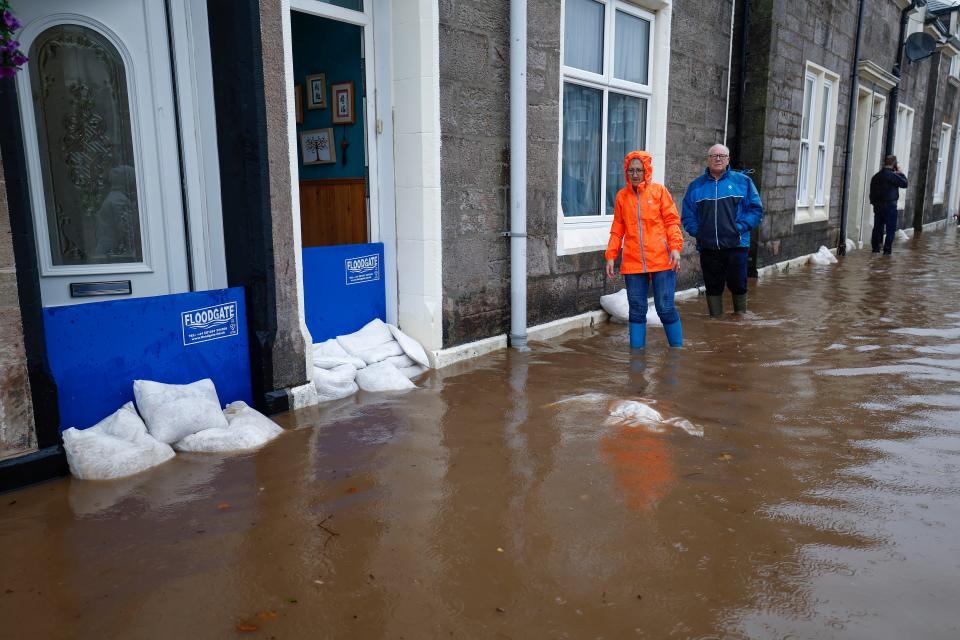 Members of the public faced flood waters in Dumbarton last week (Getty Images)