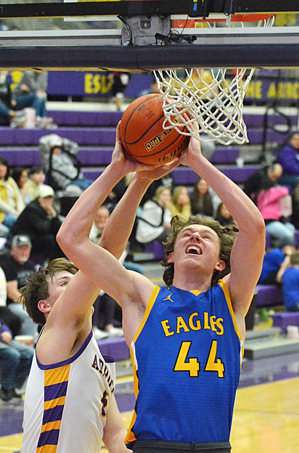 Watertown's Caden Beauchamp blocks a shot by Aberdeen Central's Grant Fritz during their high school boys basketball game on Tuesday, Feb. 13, 2024 in the Watertown Civic Arena. Watertown won 74-71.