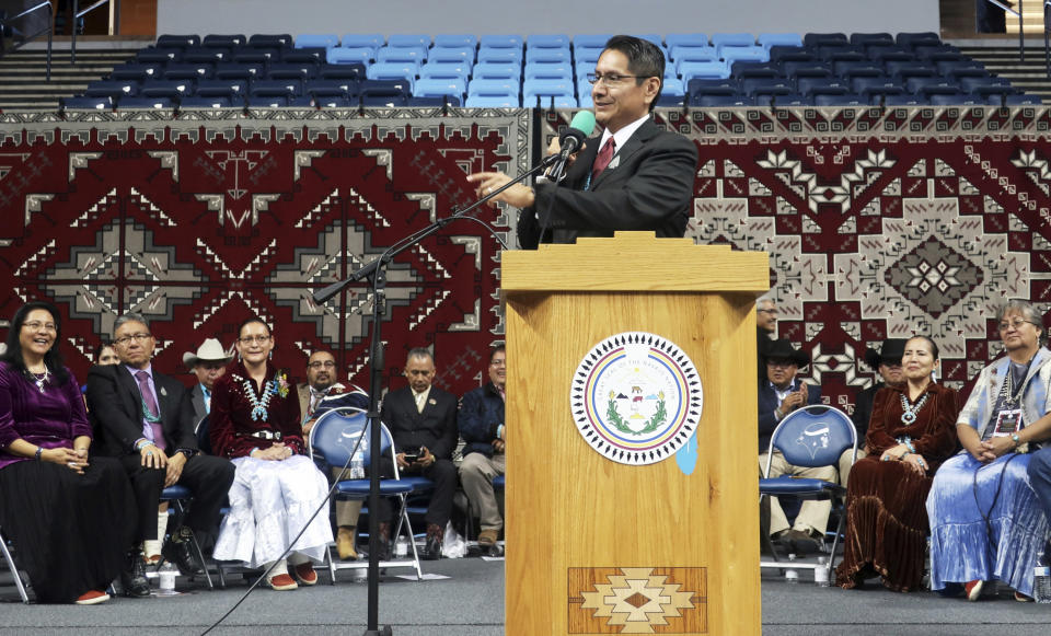 Jonathan Nez addresses a crowd after he's sworn in as president of the Navajo Nation on Tuesday, Jan. 15, 2019 in Fort Defiance, Ariz. (AP Photo/Felicia Fonseca)