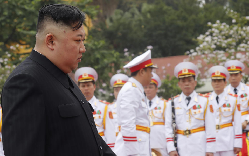 North Korean leader Kim Jong Un attends a wreath laying ceremony at Monument to War Heroes and Martyrs in Hanoi, Vietnam Saturday, March 2, 2019. (Kham/Pool Photo via AP)