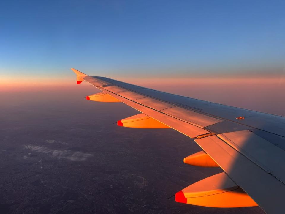 A view of the outside while the plane is in the air.