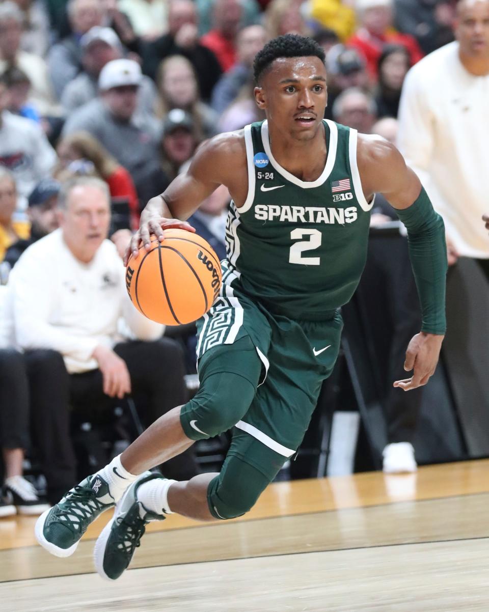 Michigan State Spartans guard Tyson Walker drives against the Marquette Golden Eagles during the second round of the NCAA tournament in Columbus, Ohio, March 19, 2023.