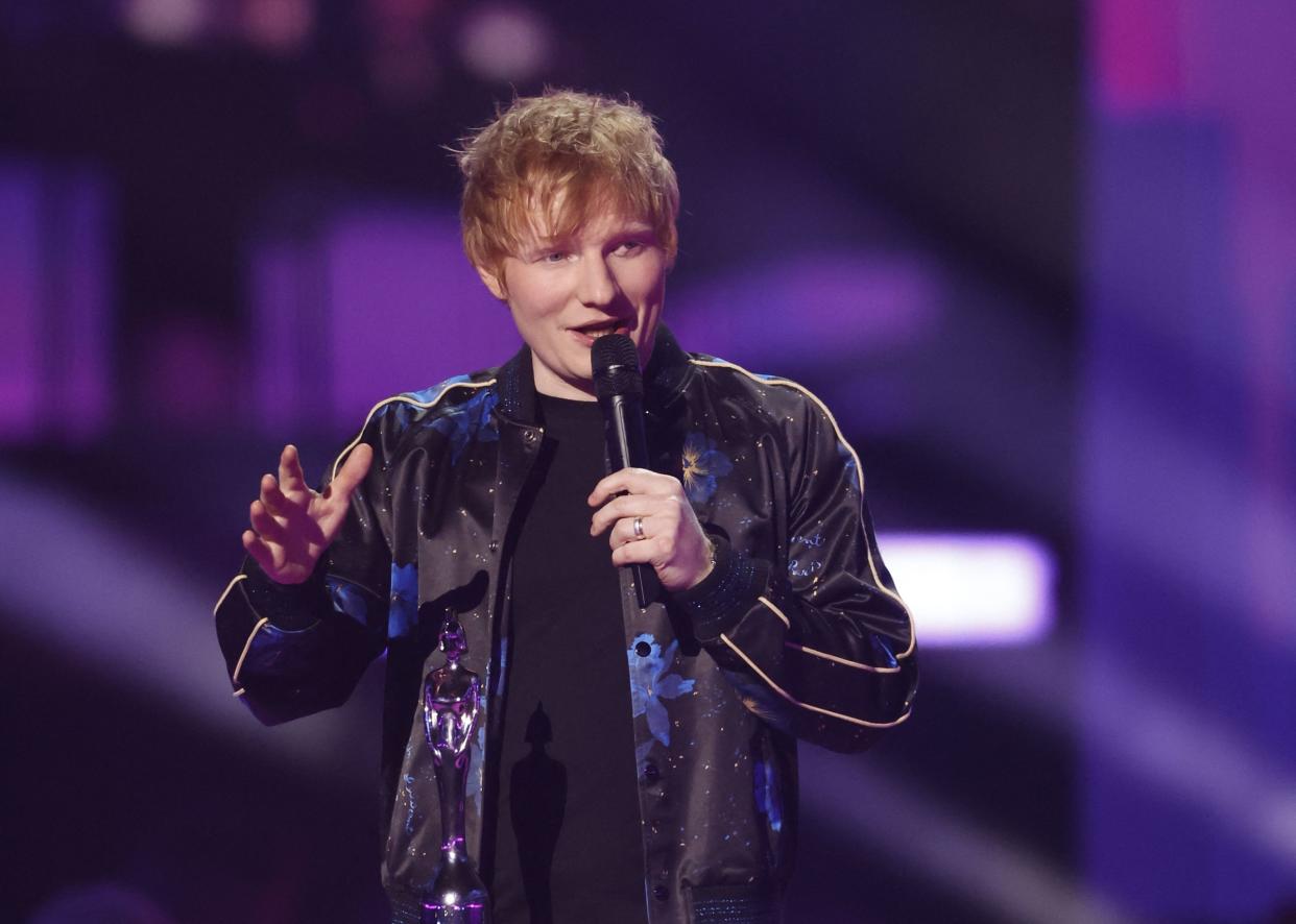 Ed Sheeran receives the award for Songwriter of the Year at the Brit Awards at the O2 Arena in London, Britain, February 8, 2022 REUTERS/Peter Cziborra