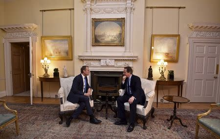 Prime Minister David Cameron (R) speaks with European Council President Donald Tusk at Downing Street in London, Britain, January 31, 2016. REUTERS/Toby Melville