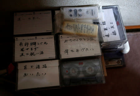 Audio tapes with recordings of Yasuhiro Sato singing karaoke are placed in a corner of Sato's room in Tokyo, Japan, July 11, 2017. Singing karaoke was Sato's hobby when he was healthy. REUTERS/Kim Kyung-Hoon