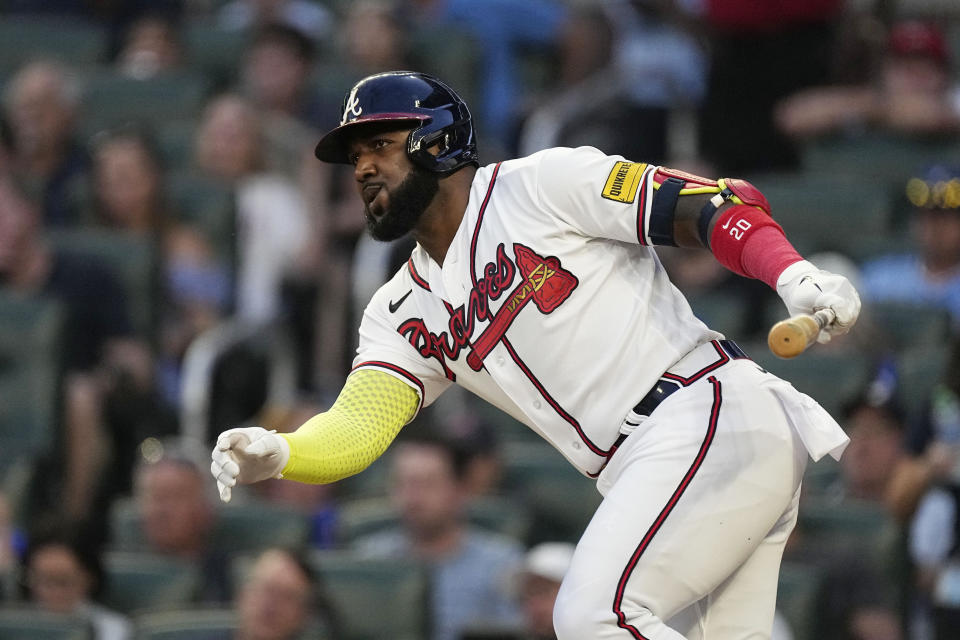 Atlanta Braves designated hitter Marcell Ozuna (20) hits a single in the fourth inning of a baseball game against the New York Mets, Wednesday, June 7, 2023, in Atlanta. (AP Photo/John Bazemore)