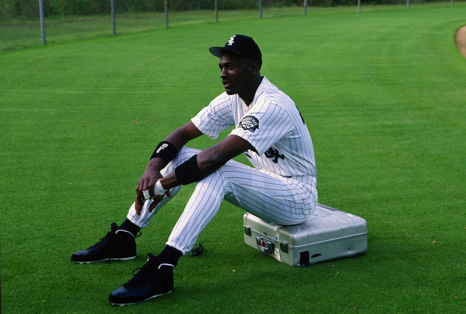 Michael Jordan sits on a camera case before a photo shoot at Hoover Metropolitan Stadium in Birmingham, Alabama. (Photo by Focus on Sport/Getty Images)