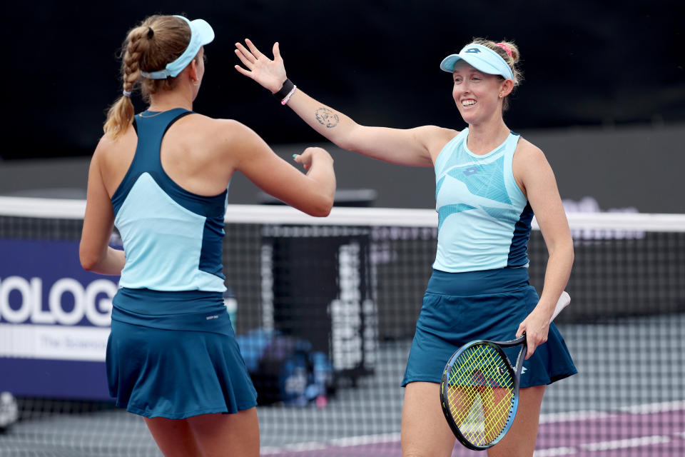 CANCUN, MEXICO - NOVEMBER 01: Storm Hunter of Australia and Elise Mertens of Belgium celebrate match point against Nicole Melichar-Martinez of United States and Ellen Perez of Australia during day 4 of the GNP Seguros WTA Finals Cancun 2023 part of the Hologic WTA Tour on November 01, 2023 in Cancun, Mexico. (Photo by Clive Brunskill/Getty Images)