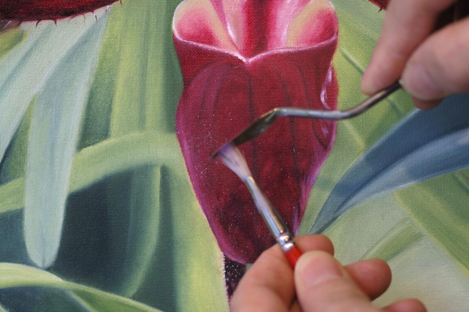 Painting the details of an orchid