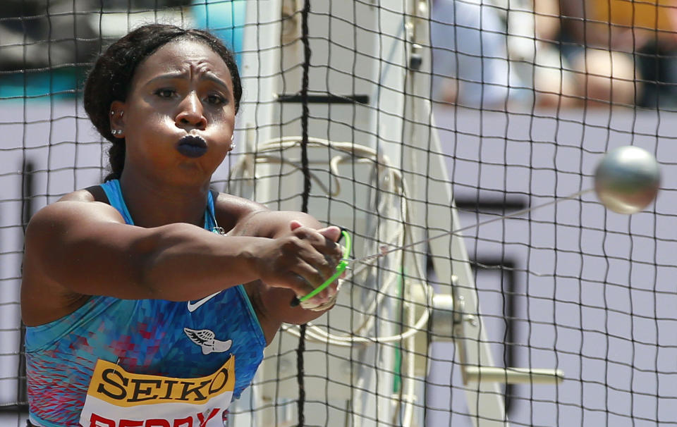 FILE - In this Sunday, May 21, 2017, file photo, Gwen Berry, of the United States, competes in the women's hammer throw at the Golden Grand Prix track and field event in Kawasaki, Japan. Gestures made at the Pan-Am Games in 2019 by Berry and fencer Race Imboden rekindled a contentious debate about the IOC's Rule 50. In a major shift in policy, the U.S. Olympic and Paralympic Committee has since committed to not sanction athletes who use their platform for social demonstrations. (AP Photo/Shizuo Kambayashi, File)