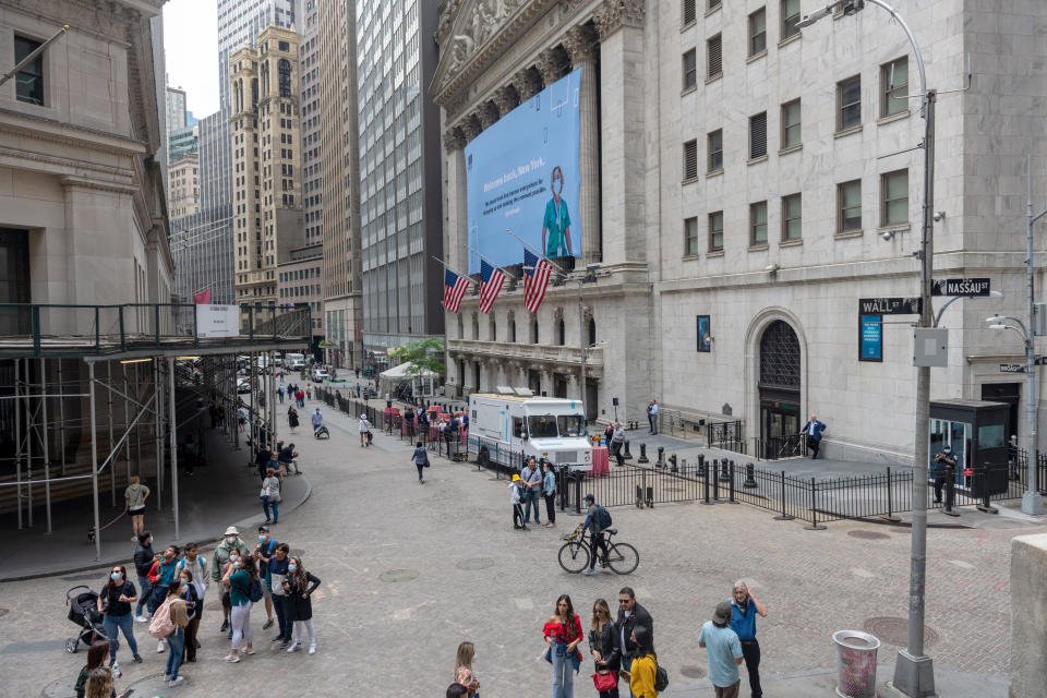 NEW YORK, NEW YORK - MAY 28: A view of the New York Stock Exchange in Lower Manhattan on May 28, 2021 in New York City. On May 19, 2021 all pandemic restrictions, including mask mandates, social distancing guidelines, venue capacities and restaurant curfews were lifted by New York Governor Andrew Cuomo. (Photo by Alexi Rosenfeld/Getty Images)